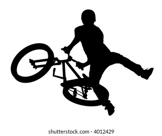 Silhouette of the bicyclist executing a stunt