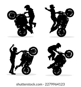 Silhouette of a biker making dangerous stunts on his motorcycle.Vector silhouette set