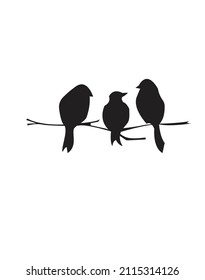 Silhouette of a bird perched on a wooden branch