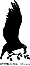 silhouette of bird sitting on branch