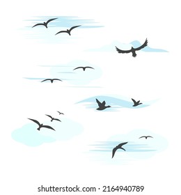 The silhouette of a bird in the sky. Vector set on a white background. Emblem, logo. A design element.