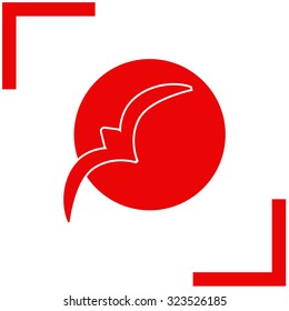 Silhouette of the bird at sunset. Vector