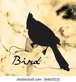 Silhouette bird vintage ink on a gold background. Lettering.