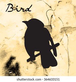 Silhouette bird vintage ink on a gold background. Lettering.