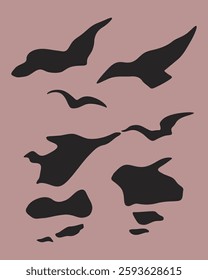 silhouette of birds flying in the evening sky