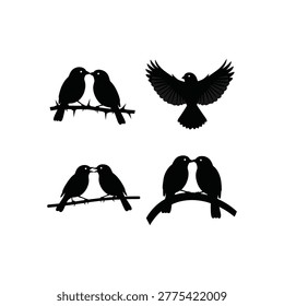 Silhouette of birds sitting on branches