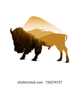 Silhouette of bison with autumn mountain panorama.