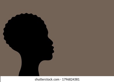 Silhouette of a black man looking up.  Concept of dream, future confidence. Copy space.