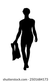 silhouette of a black shadow of a man walking carrying swimming fins