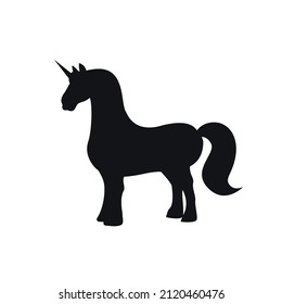 Silhouette of a black unicorn with a horn stands 