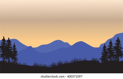 Silhouette of blue mountain at the sunset