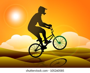 Silhouette de un ciclista BMX practicando sobre arena al fondo de la noche. EPS10.