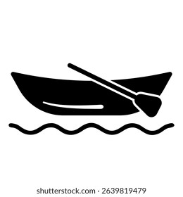 A silhouette of a boat with a paddle rests on a body of water, depicting recreation or transportation.