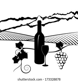 Silhouette of bottle of wine with glass and vineyard in background