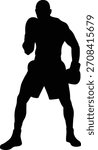 Silhouette of a boxer in fighting stance ready to punch