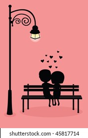 silhouette of boy and girl hugging under the light of candelabrum