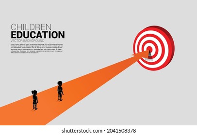 Silhouette of boy and girl standing on route path to targeting. Concept of education solution and future of children.