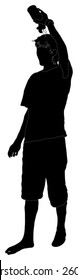 Silhouette of boy pouring water on his head to cool down.