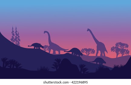 Silhouette of Brachiosaurus and Ankylosaurus at the morning
