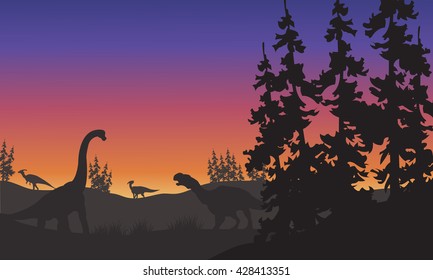 Silhouette of Brachiosaurus and Iguanodon at tthe afternoon