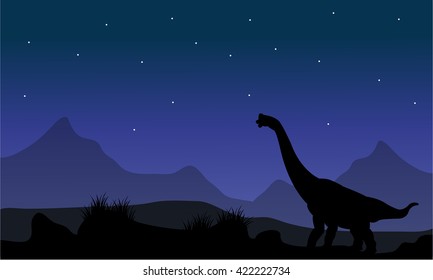 Silhouette of brachiosaurus in park at the night