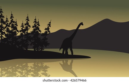 Silhouette of Brachiosaurus in riverbank a beautiful scenery