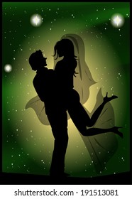 Silhouette of bride and groom on the background of the beautiful starry sky 