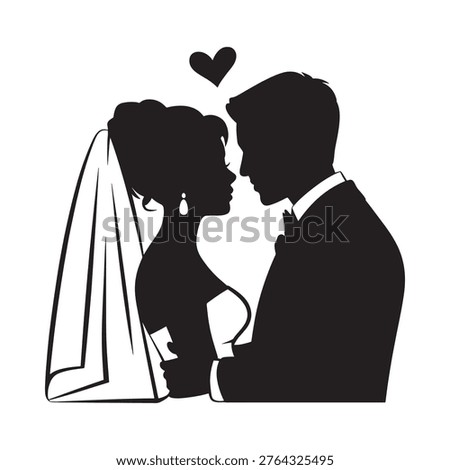 Silhouette of a bride and groom sharing a tender moment during their wedding