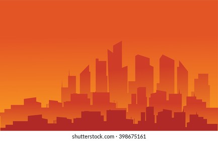 Silhouette of building with orange background at sunset