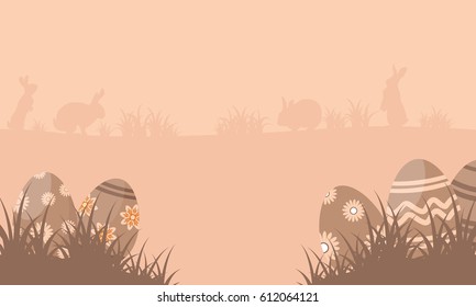 Silhouette of bunny with easter egg landscape vector art