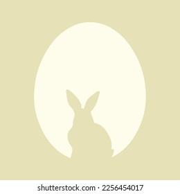 Silhouette of bunny and Easter egg on color background