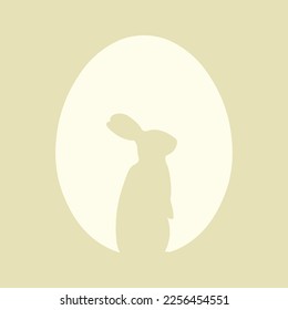 Silhouette of bunny and Easter egg on color background