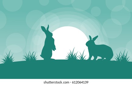 Silhouette of bunny and light landscape vector art