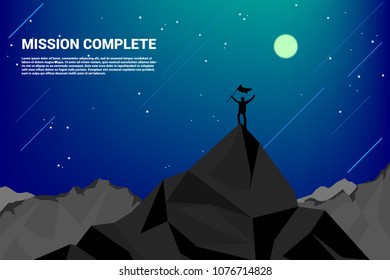 Silhouette of a business man on top of mountain: concept of success in career and mission