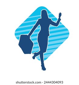 Silhouette of a business woman wearing office work women suit in pose carrying briefcase