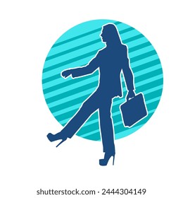 Silhouette of a business woman wearing office work women suit in pose carrying briefcase