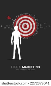 silhouette of businessman and  arrow on center of dartboard. Business Concept of targeting and customer.Company vision mission.