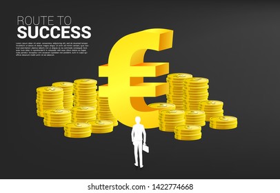 silhouette of businessman with the briefcase standing in front of euro currency money icon and stack of coin. Concept of success business and Career path in euro zone.