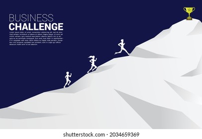 Silhouette of Businessman and businesswoman running to golden trophy on mountain. Concept for business direction and competition.