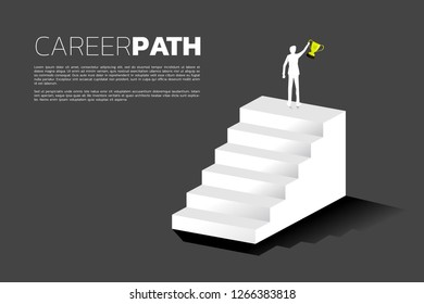 silhouette of businessman with champion trophy on top of stair. Concept of growth business, Success in Career path.