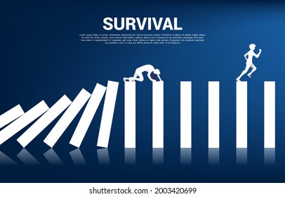 Silhouette Of Businessman Crawl On Domino Collapse. Concept Of Business Industry Disrupt.