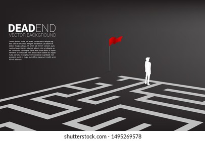 Silhouette of businessman at dead end of maze. Business concept for problem and wrong decision.