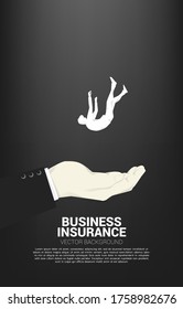 silhouette of businessman falling down in big hand. Concept for safety and insurance business