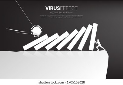 silhouette of businessman falling down by domino effect from corona virus to drop from valley. Concept for economic crisis from virus outbreak.