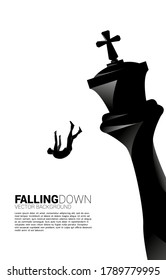 Silhouette of businessman falling down from the king chess. concept of business strategy and  fail situation.