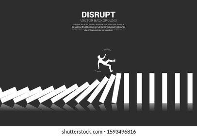 Silhouette of businessman falling on collapse domino. business concept of business disruption and domino effect 