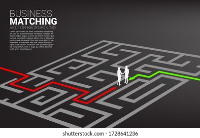 Silhouette of businessman handshake in the maze. Concept of business matching. Team work  partnership and cooperation.