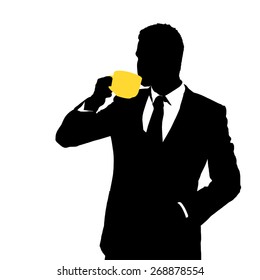 Silhouette of businessman holding a cup of coffee 