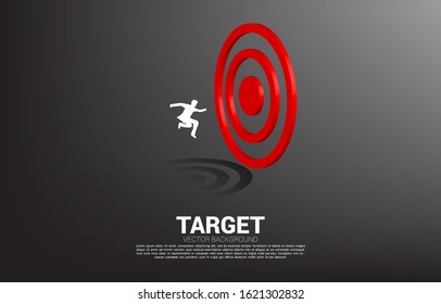 silhouette of businessman jump to target dartboard. Concept of vision mission and goal of business