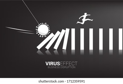 Silhouette of businessman jumping away on collapse domino from corona virus effect. business concept of business disruption and domino effect from pandemic. 